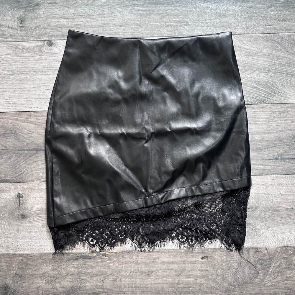 Black mini skirt with lace bottom detail